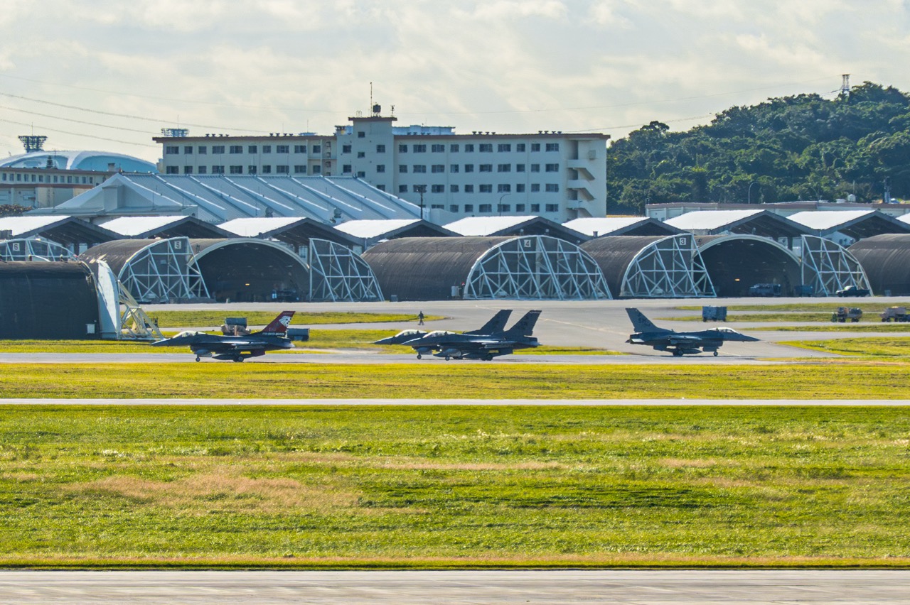 Line of F-16 jets on the Kadena Air Base flight line.