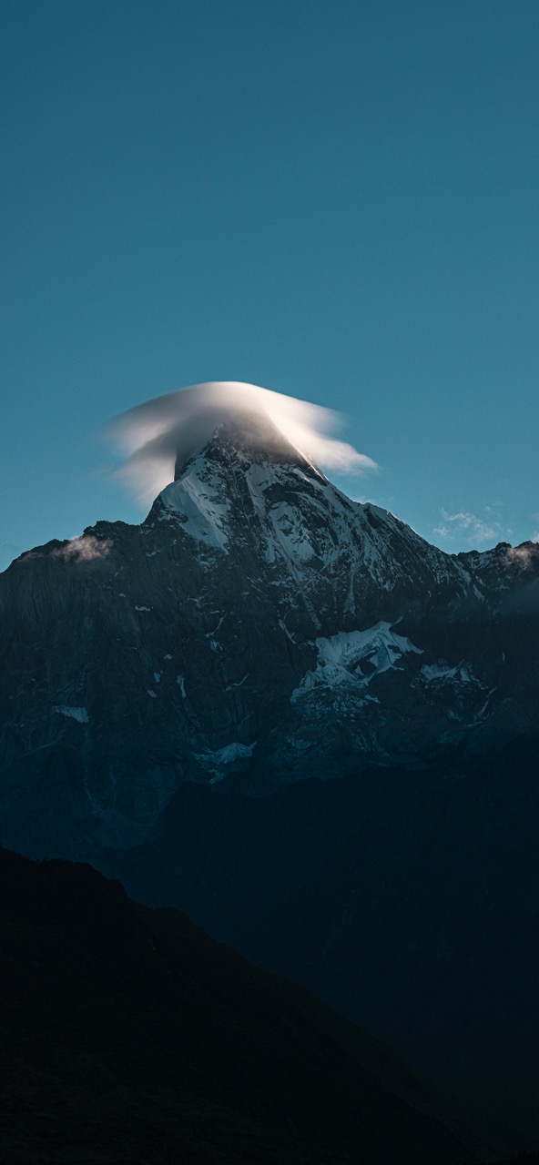 Morning light spilling across a Siguniangshan mountain lodge.