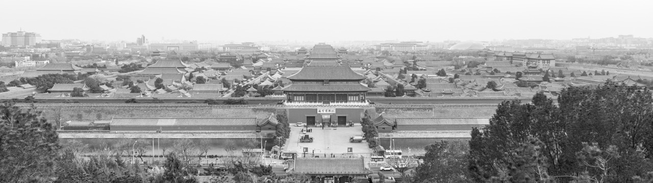 Black-and-white faded corridor inside the Forbidden City.