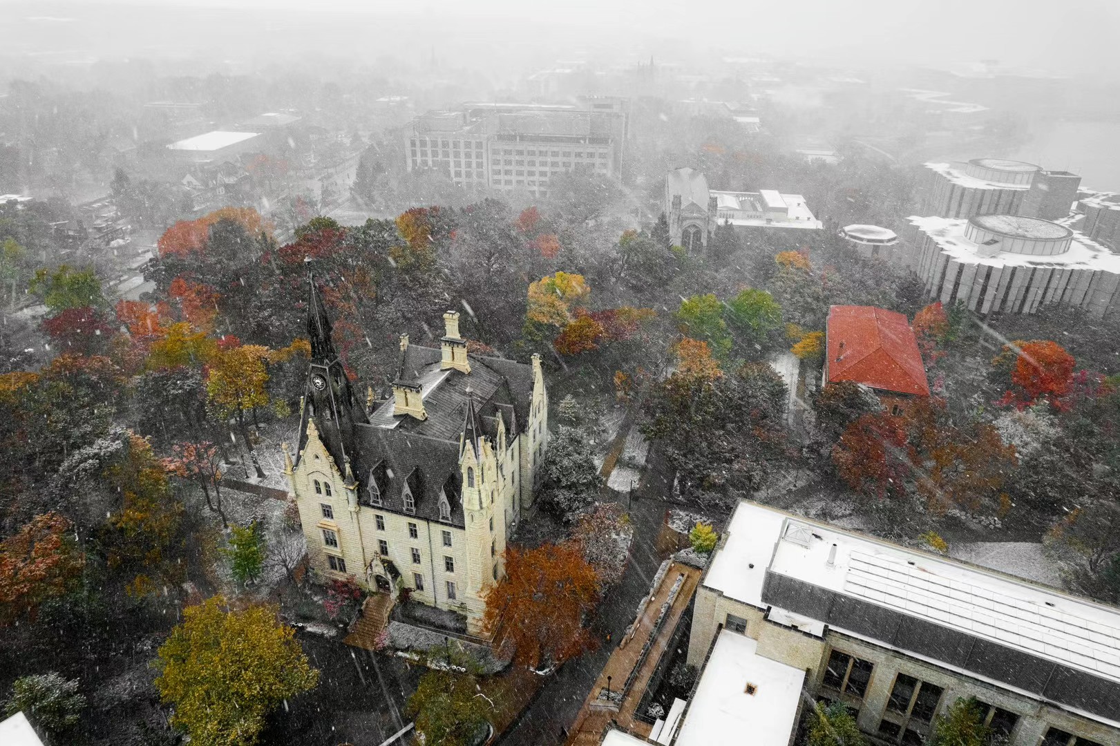 Aerial of Northwestern University during a colorful first snowfall.